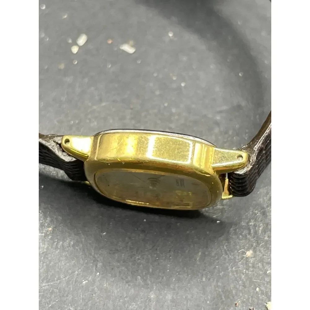 Vintage Seiko Watch Women's Champagne Dial Gold Tone Oval 4N01-5819 Brown Band